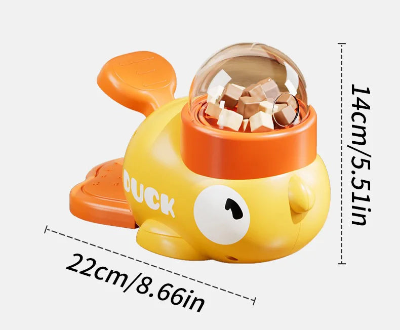 Toy duck with a transparent body containing small objects, labeled with dimensions on a white background.